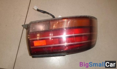 Фонарь задний наружный левый от Toyota Camry V30, XV10 1990-1994
