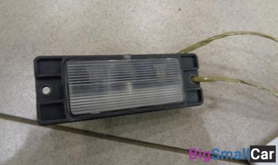 Фонарь подсветки номера от Mitsubishi Mirage 5 1995-2003
